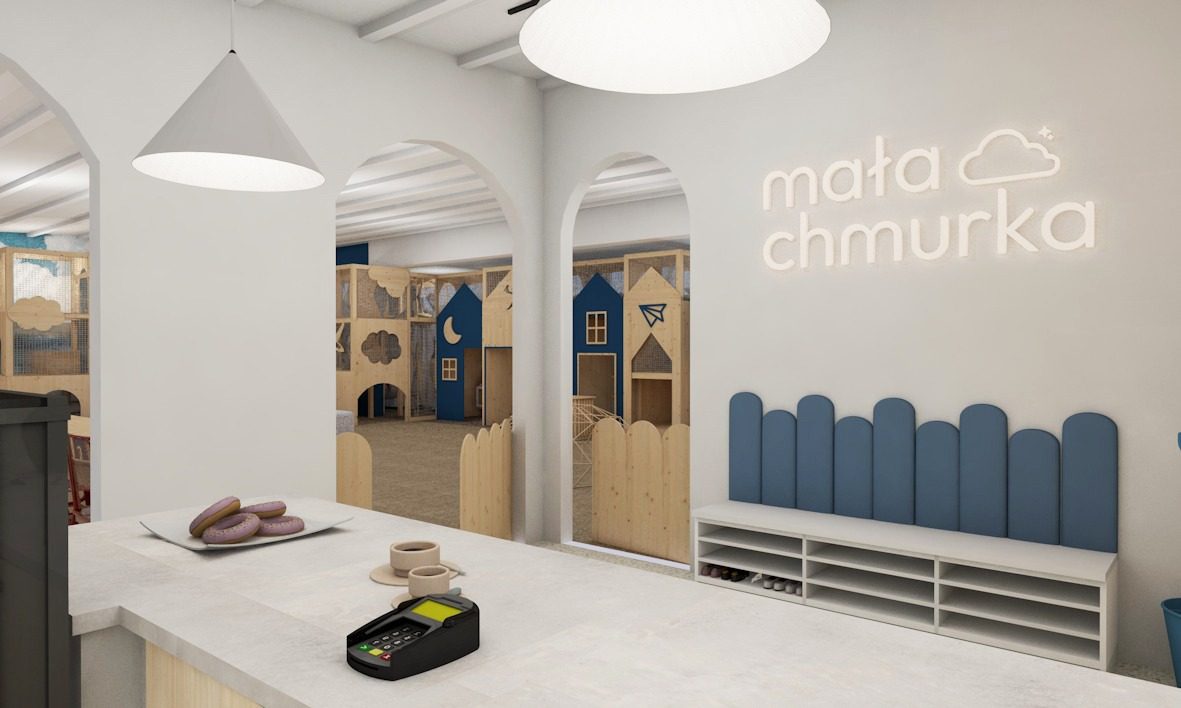 Bar kawiarni i logo Mała Chmurka na ścianie